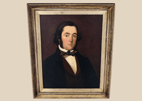 Early Victorian British oil portrait of a gentleman in a dark frock coat and patterned cravat