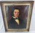 Framed Victorian male portrait with a deep burgundy-brown background and giltwood frame