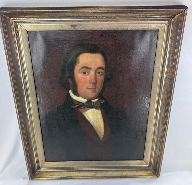 Framed Victorian male portrait with a deep burgundy-brown background and giltwood frame