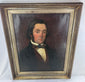 Framed Victorian male portrait with a deep burgundy-brown background and giltwood frame