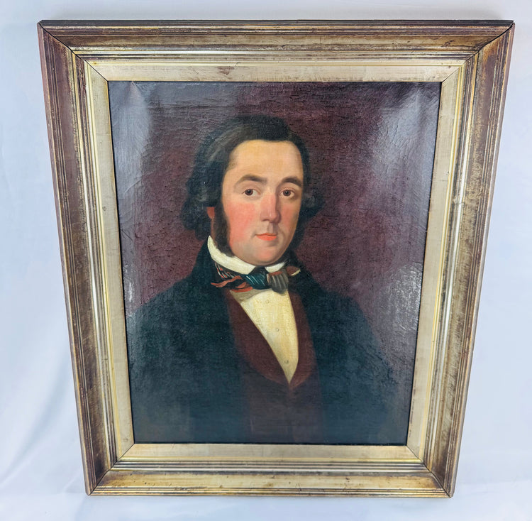 Antique oil-on-canvas portrait of a formally dressed British gentleman, circa 1835–1850