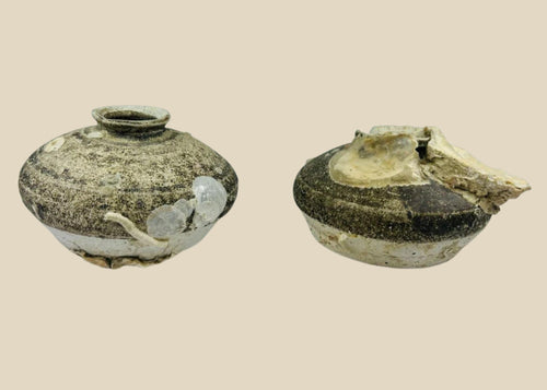 Pair of Ming dynasty discoid stoneware jarlets recovered from a Philippine shipwreck, 15th–16th century CE. Partial brown glaze with barnacle and mussel encrustations. One jarlet bears National Museum of the Philippines label. Excellent maritime provenance and well-preserved condition.