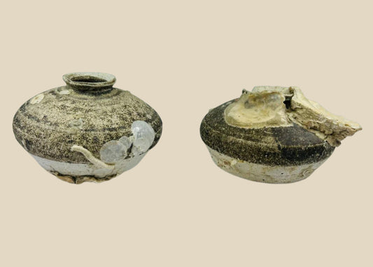 Pair of Ming dynasty discoid stoneware jarlets recovered from a Philippine shipwreck, 15th–16th century CE. Partial brown glaze with barnacle and mussel encrustations. One jarlet bears National Museum of the Philippines label. Excellent maritime provenance and well-preserved condition.