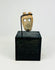 Pre-Columbian bone mask pendant with hollowed eyes and open mouth, ritual funerary object