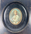 19th century portrait miniature of the Duke of Reichstadt, gouache on wafer, detailed sash and insignia, housed in brass-mounted oval frame.