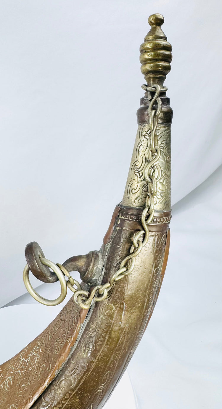 Late 19th-century North African powder horn with foliate ornament and carrying rings