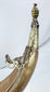 Late 19th-century North African powder horn with foliate ornament and carrying rings