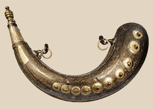 Antique Moroccan brass powder horn with crescent-shaped body and engraved floral decoration
