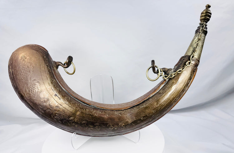 Ceremonial Moroccan powder horn with hand-engraved vinework and geometric borders