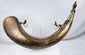 Ceremonial Moroccan powder horn with hand-engraved vinework and geometric borders