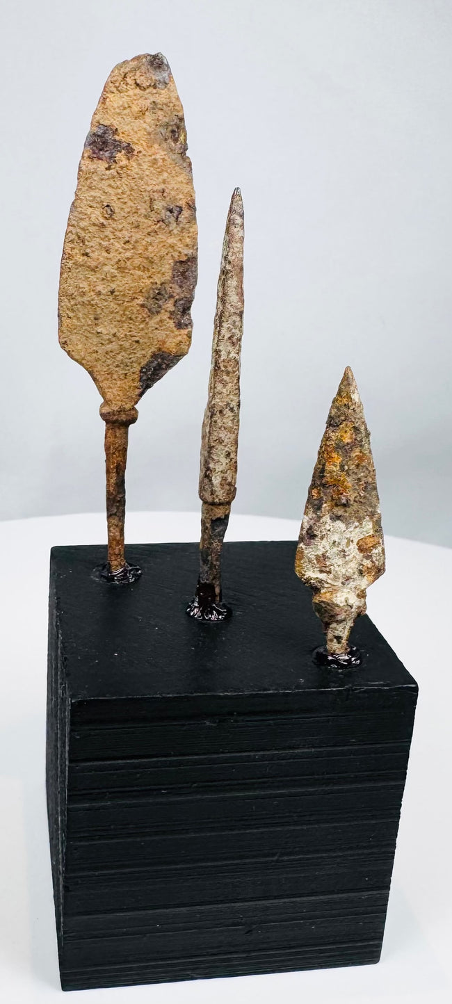 Long narrow bodkin-style medieval projectile point with heavily oxidized surface