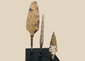 Group of three ancient Roman to medieval iron projectile points on black display bases