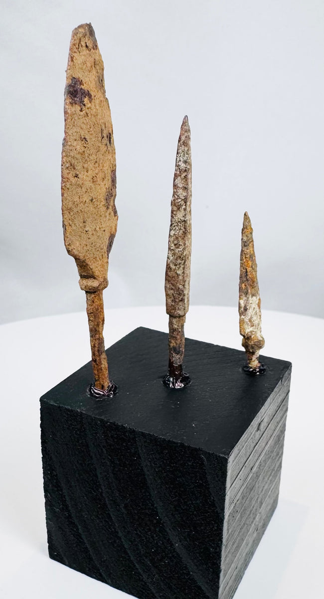Mounted ancient iron projectile point collection dating from the 3rd–14th century CE