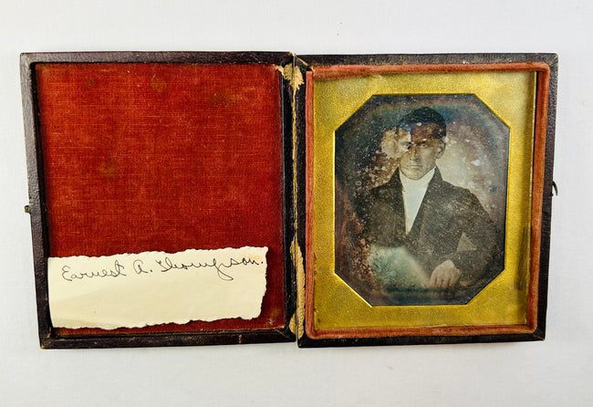 Military remembrance archive including medals, Bible relics, photographs, and naval history