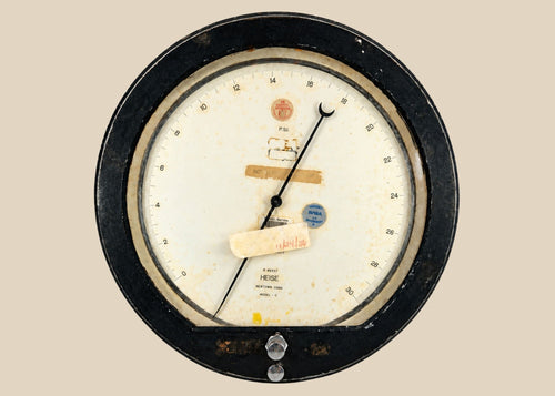 Vintage NASA Space Shuttle Heise low-pressure gauge with black metal casing and white dial