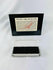 Authentic NASA Space Shuttle Thermal Protection System Tile from the 1980s, displayed in original NASA case with documentation verifying authenticity.