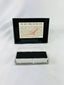 Authentic NASA Space Shuttle HRSI tile from the 1980s, silica-based ceramic with black Reaction Cured Glass (RCG) coating, designed for high-temperature reentry, displayed in original NASA-issued case with documentation.