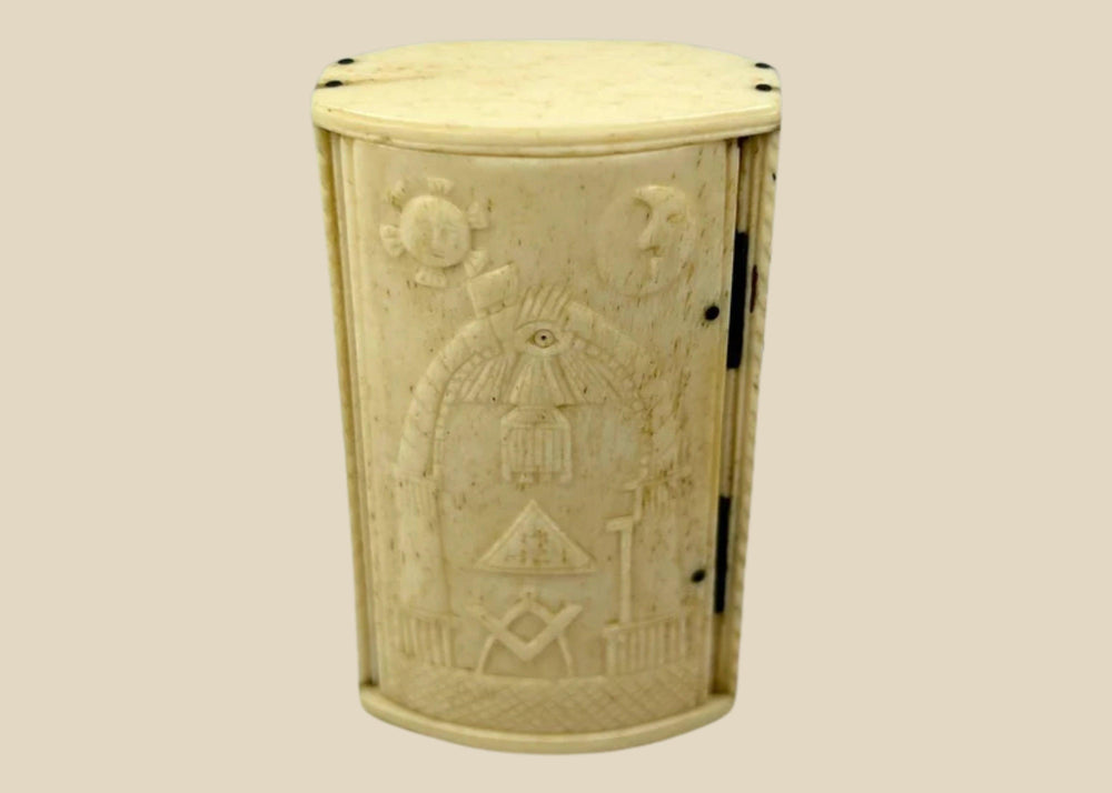 Antique Napoleonic Wars snuff box, hand-carved bone with Masonic symbols including Square and Compasses, All-Seeing Eye, Sun and Moon, crafted by French POWs in Britain circa 1795–1815.