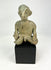 Pre-Columbian West Mexican Nayarit Chinesco terracotta seated male figure on display stand