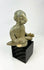 West Mexican Chinesco seated male figure with traces of red pigment and burial patina