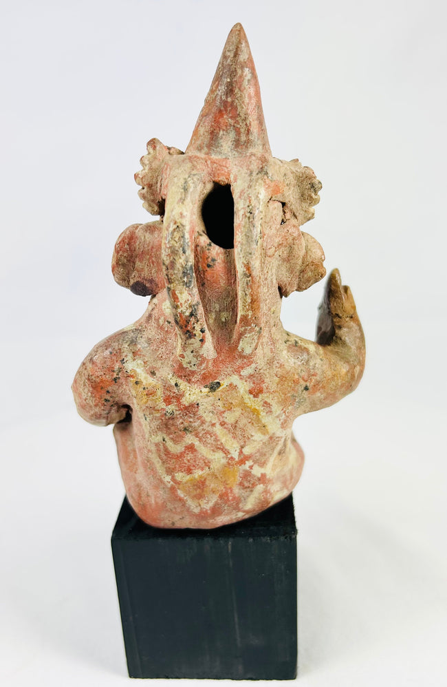 Ancient Nayarit terracotta figure with turban-style headdress and mineral accretions