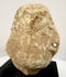 Ancient-style Near Eastern sculptural fragment featuring deeply recessed eyes and distinctive geometric facial carving.