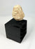 Ancient Mesopotamian stone idol head, ritual votive fragment from the Near East, displayed on stand
