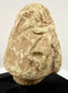 Rear view of beige Mesopotamian limestone idol head with rough unfinished back