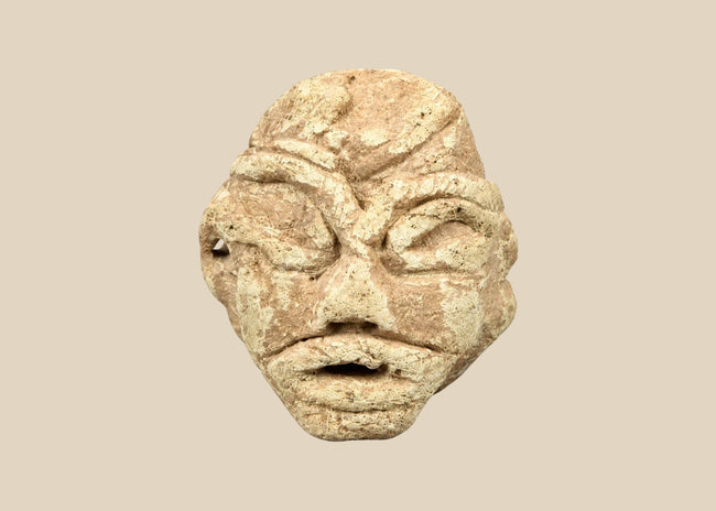 Mesopotamian style carved limestone idol head with almond eyes