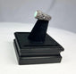 Neo-Assyrian silver ring featuring engraved winged serpent and mythical beast motifs