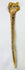 Side profile of New Guinea human humerus dagger showing elongated tapered form and preserved bone structure