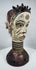 Hand-carved Igbo ceremonial masquerade headdress with dual-faced Janus design and original pigment decoration.