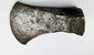 Antique 19th-century axe head with curved blade design and frontier-era wear from daily woodcutting use.