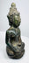 Left-side view of the Lan Na bronze Buddha and diagonally draped monastic robe