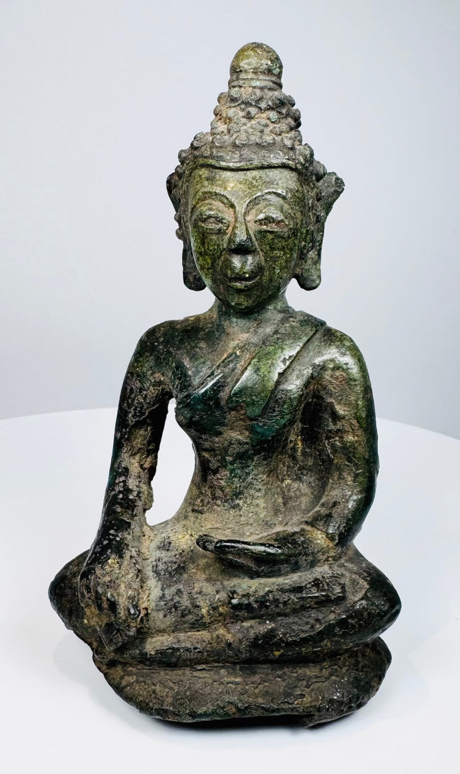Northern Thai bronze Buddha displaying bhumisparsha mudra and a low base