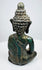 Rear view of the Lan Na Buddha showing tiered snail-shell hair curls