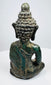 Rear view of the Lan Na Buddha showing tiered snail-shell hair curls