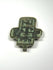 Reverse view of historic copper-alloy cross pendant showing wear and enamel
