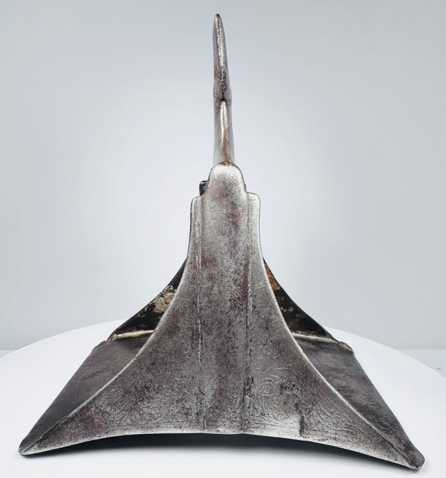 Forged steel cavalry stirrup associated with Ottoman mounted warfare, combining functional design with ornate metalwork.