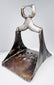 Ottoman Empire stirrup circa 17th century with pierced steel tread, broad arch, and preserved historic surface wear.
