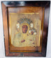 19th-century Polish-style Black Madonna icon displaying intricate repoussé work and crowned sacred figures.