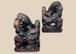 Antique Chinese Qing Dynasty wooden guardian lion pair with dark lacquer, red pigment and carved brocade balls