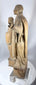 Antique European saint sculptures carved from hardwood with visible tool marks and natural wear.