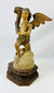 Antique church or chapel angel carvings mounted on tiered octagonal bases