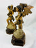 Hand-carved devotional angel figures with traces of original paint and gold gilding