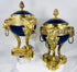 French Louis XVI Revival Sèvres-style porcelain vases featuring cobalt-blue bodies and gilt bronze mounts.
