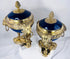 Louis XVI Revival covered vases in the manner of Sèvres porcelain with richly gilded bronze ornamentation.