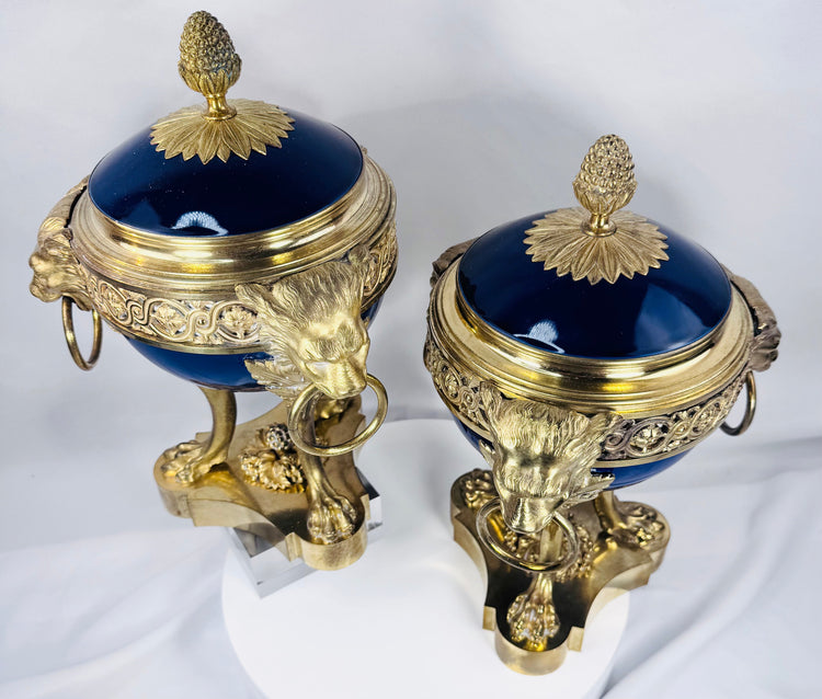 Louis XVI Revival covered vases in the manner of Sèvres porcelain with richly gilded bronze ornamentation.