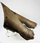 Close-up of articulation and engravings on Gothic-style steel gauntlets.