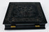 Mid-19th-century thermoplastic photographic case with ornate molded relief decoration and brass hinges